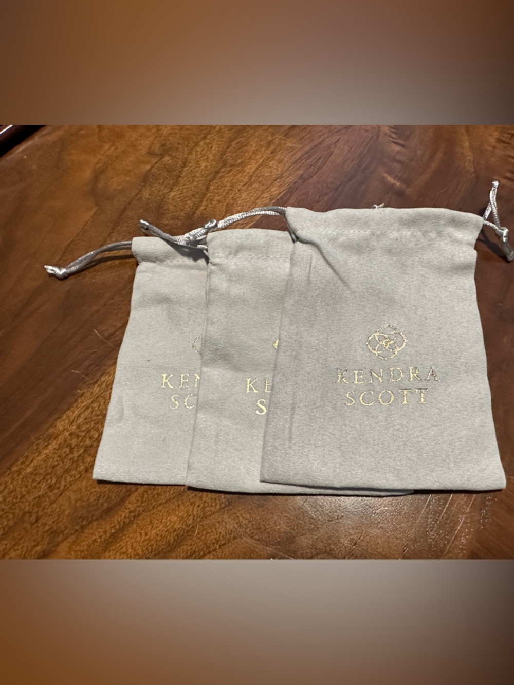 Kendra Scott Taupe Suede Drawstring Jewelry Pouches with Gold Logo - Set of 3